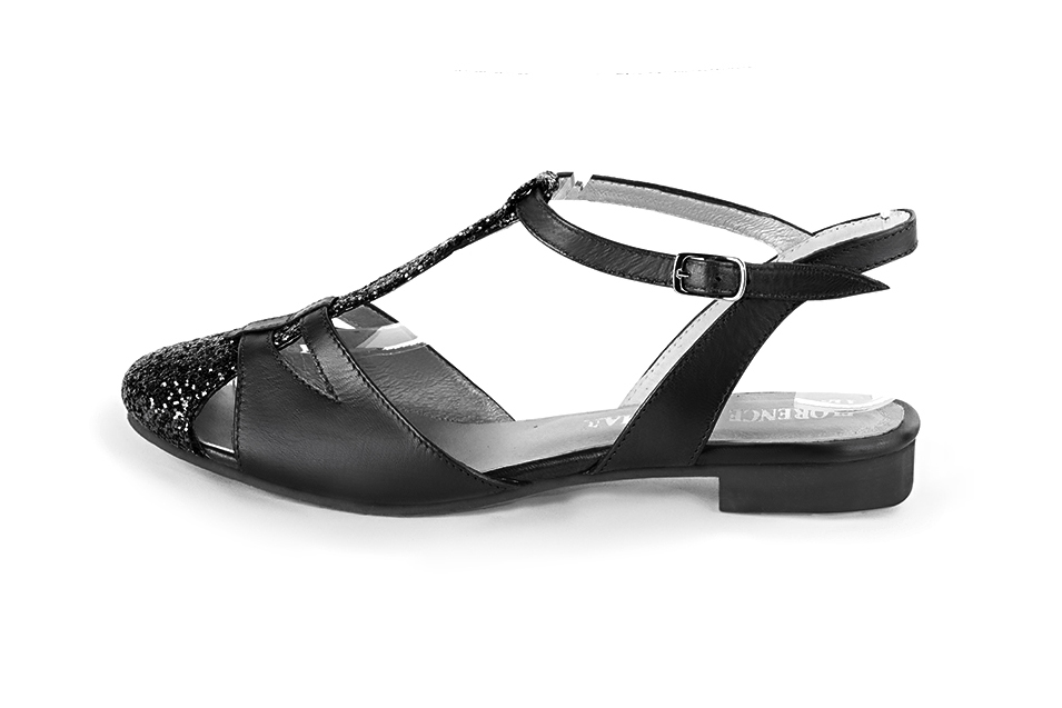Gloss black women's open back T-strap shoes. Round toe. Flat leather soles. Profile view - Florence KOOIJMAN
